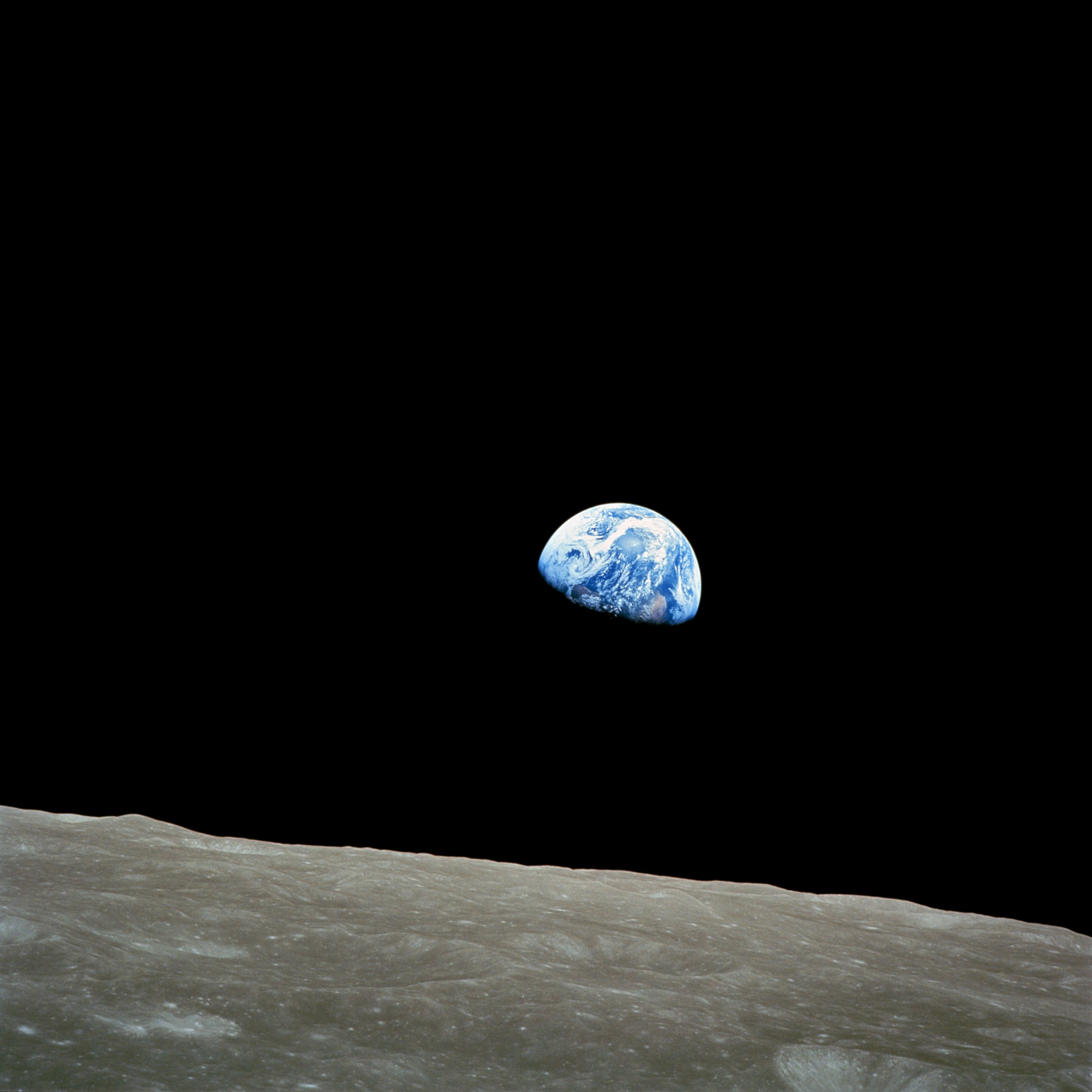 View of Earth rising over the lunar horizon, taken from Apollo 8